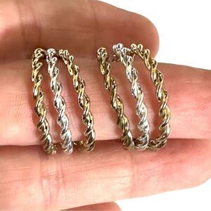 NWH silver and gold tone clip on earrings